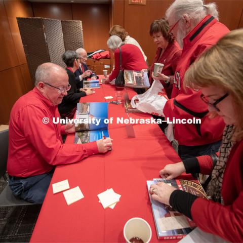 Book signing with Craig Chandler, Kim Hachiya, and Ted Kooser. Everyone was invited to enjoy a cupcake and join in the festivities with their Husker friends at the Wick Alumni Center, Friday February 15th. The Nebraska Charter was available to view, along with other historical items. Copies of Dear Old Nebraska U could be purchased and signed. Charter Day at the Wick Alumni. February 15th, 2019. Photo by Gregory Nathan / University Communication.